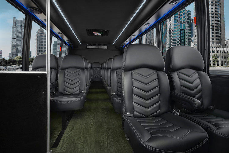 interior image of TLC Luxury Transportation's 15 passenger mini bus rental full of comfortable seats