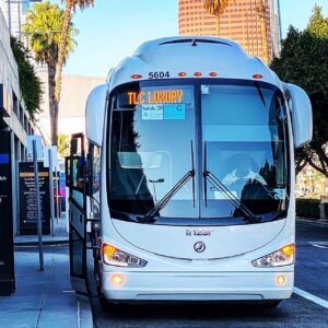 white charter bus parked in Los Angeles